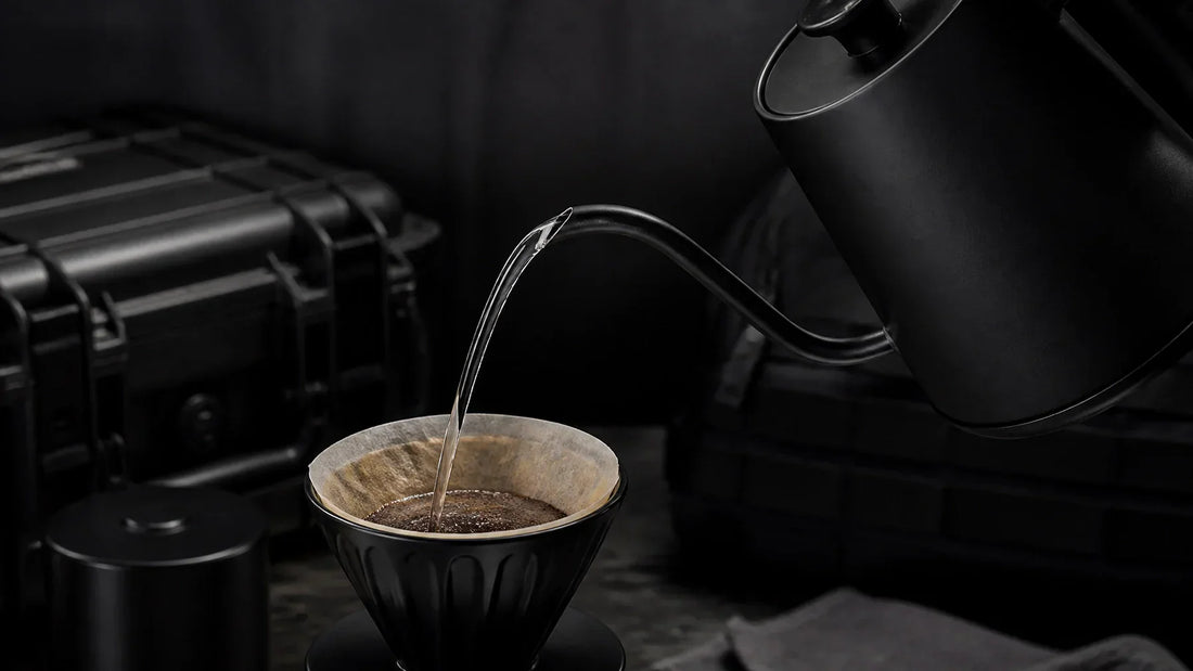 Water droplets and specialty coffee beans illustrating brew water chemistry for Grenade Coffee