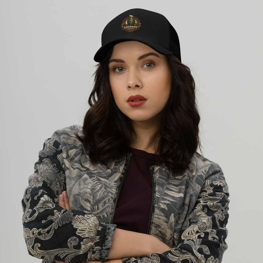 Six-panel mid-profile trucker cap with mesh back and adjustable closure