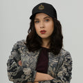Six-panel mid-profile trucker cap with mesh back and adjustable closure