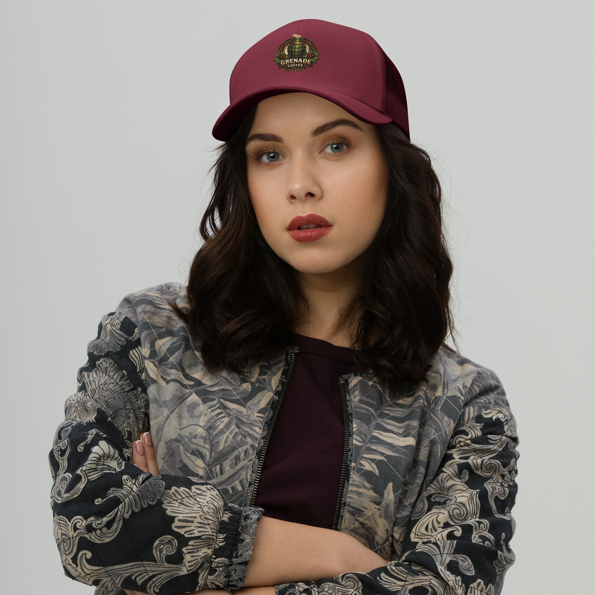 Six-panel trucker cap with mesh back and adjustable closure for sun protection