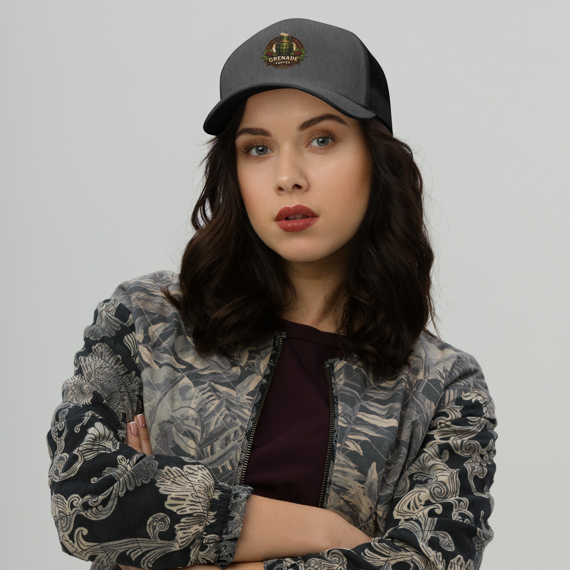 Six-panel trucker cap with mesh back and adjustable closure for sun protection