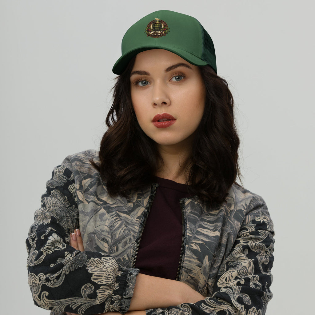 Six-panel trucker cap with mesh back, adjustable closure, and permacurv visor